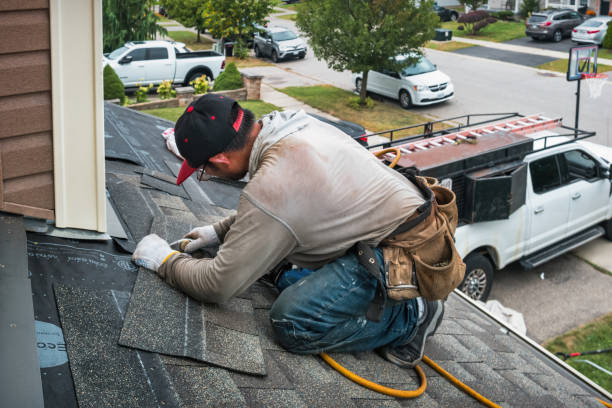 Professional Gutter Installation technician working in Laingsburg, MI